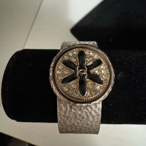 Textured Silver Bracelet with Black Floral Design